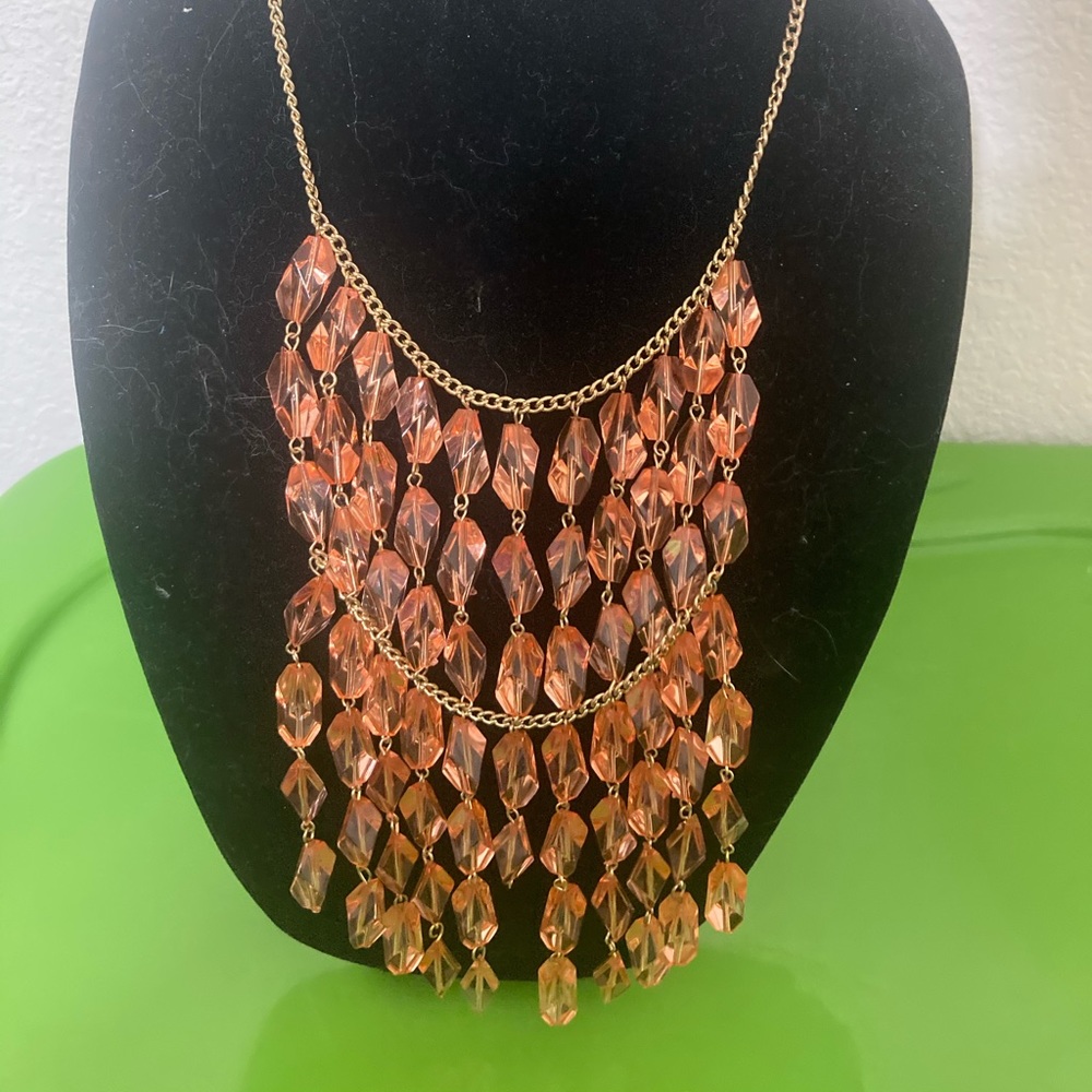 Women’s orange necklace & earrings